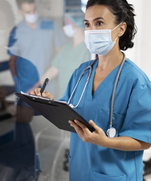 side-view-nurse-with-mask-taking-notes